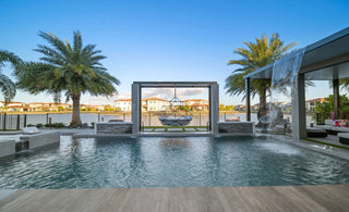 A Poolside Haven, Tucked Away In The Backyard Of This South Florida Residence