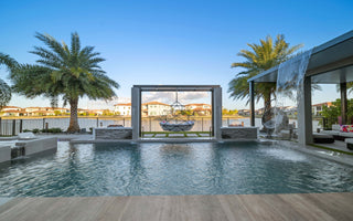 A Poolside Haven, Tucked Away In The Backyard Of This South Florida Residence